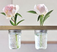 亲手制作一个创意别致的螺旋玻璃罐小花架
